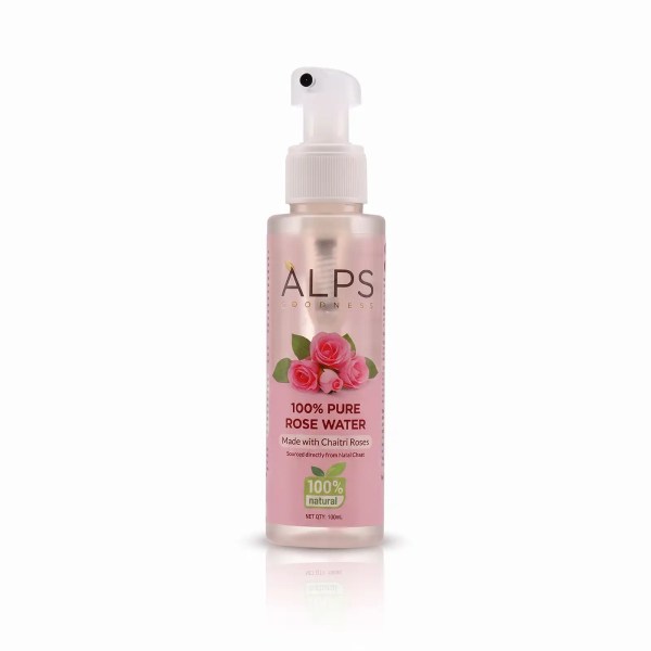 Alps rose water spray bottle in floral skincare setting