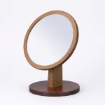 Tabletop makeup mirror with brown round frame
