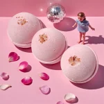 Cherry blossom bath bomb set with petals and spa-style bath decor