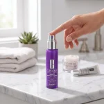 Woman reaching for Smart Clinical Repair Serum 30ml Clinique