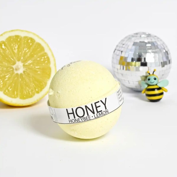 Lemon bath bomb with honeybee and citrus accents
