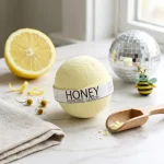 Lemon bath bomb displayed in a relaxing bath setup